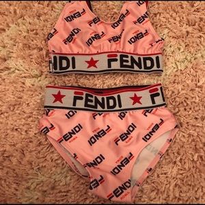 FF bathing suit is fitting for 12 months - 2t